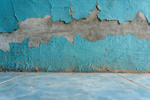 老房子的墙面纹理。蓝房子外墙破旧。图片下载