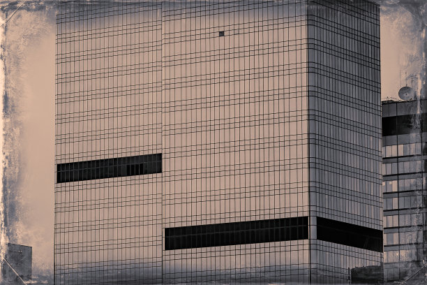 城市商业区一座玻璃摩天大楼的极简主义窗户图片下载