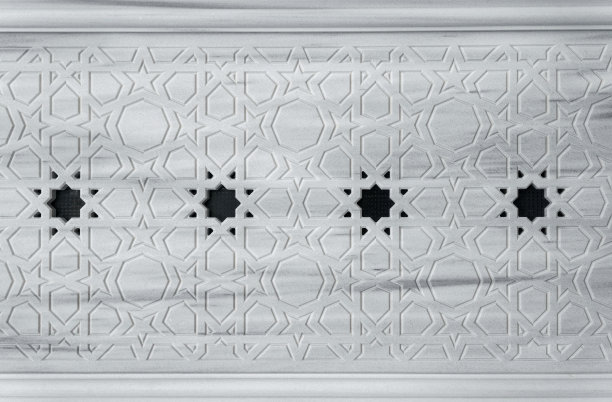 东方风格的石雕花卉墙图片下载