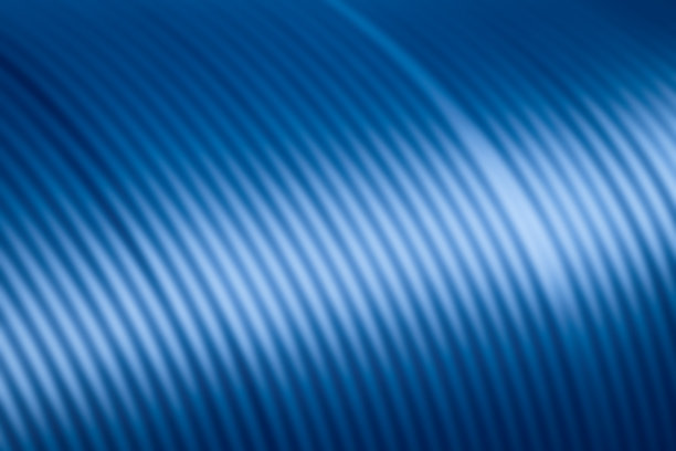 用渐变照明抽象蓝色螺旋图案模糊背景图片下载