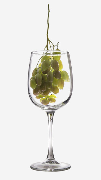 一个带有葡萄酒的玻璃杯的创意图像图片下载