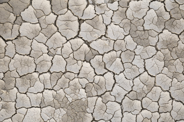 干裂和干燥的土壤在干燥的湖泊背景图片下载