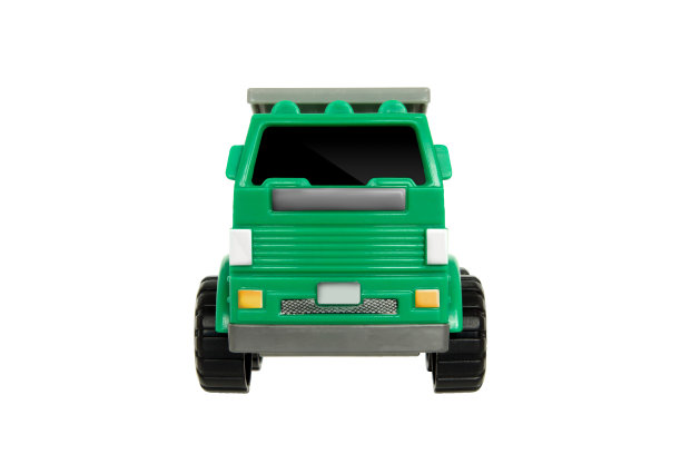 玩具自卸卡车，为孩子们玩和提高他们的学习绿色卡车与灰色托盘孤立在一个与剪贴路径的背景图片下载
