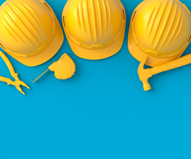 在蓝色和黄色上修理的单色建筑工具的俯视图图片下载