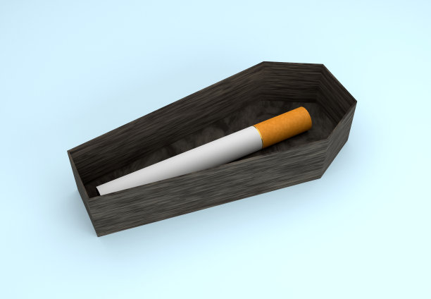 因吸烟而死亡。棺材里的香烟。图片下载