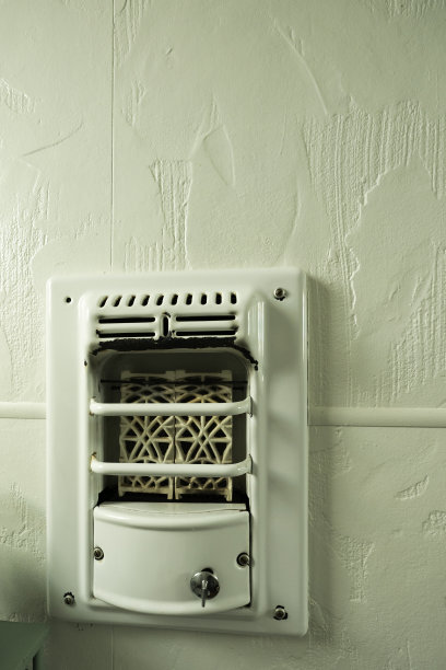 1880年路易斯安那州一家小旅馆里的老式壁式加热器图片下载