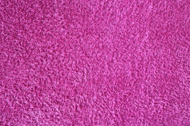 扁平的粉红色织物的软毛巾-特写背景纹理图片下载