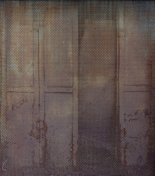 生锈的金属栅格从一个监狱或监狱的老旧的风化门-可怕的工业背景图片下载