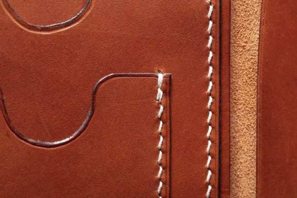 部分棕色皮革钱包或钱包的特写。图片下载
