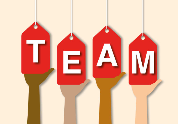 一群人手持团队标志，团队和团队理念。图片下载