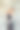 灰色背景下穿着黑衣服的漂亮女人的肖像图片下载
