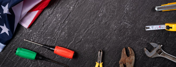 美国劳动节与工作工具的俯视图设计概念。图片下载