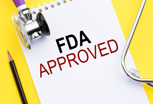 FDA -食品和药物管理局批准黄色表听诊器文件文本。保健或医学概念图片下载