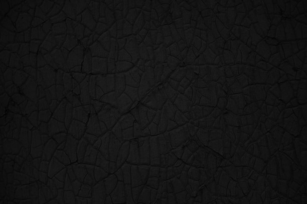 抽象的黑色背景。剥落的油漆,纹理。深色背景与裂缝，复制空间设计。网页横幅。图片下载