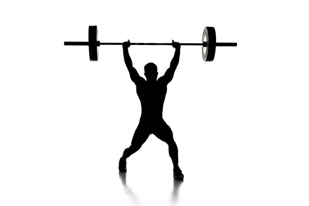 一名男子的全身肖像在运动服锻炼与重量孤立在白色背景图片下载