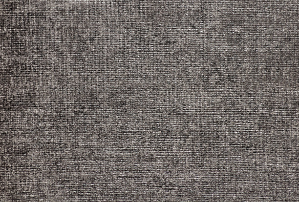 一个黑色和白色的织物碎片的特写。图片下载