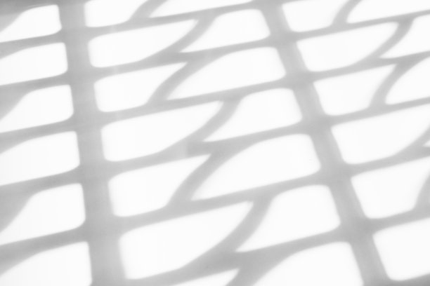 抽象的阴影落在白色的墙壁背景图片下载