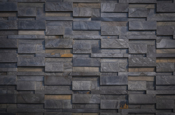 灰色石板墙背景表面的渐变光，复古色调风格图片下载