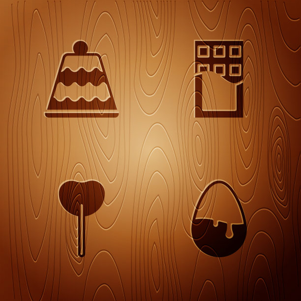 放上巧克力蛋蛋糕、棒棒糖和巧克力棒图片下载