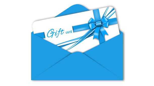 礼品卡与蓝色丝带蝴蝶结在蓝色信封孤立在白色背景与阴影最小的概念图片下载