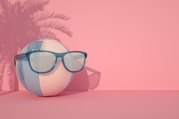 暑假和旅游的概念，沙滩球戴太阳镜图片下载