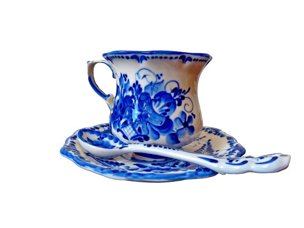 茶杯。俄罗斯传统Gzhel风格的餐具，白色背景，孤立。俄罗斯民间陶瓷工艺和生产瓷器，是俄罗斯民间绘画的一种。图片下载