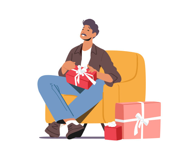 快乐的父亲坐在扶手椅上，手里拿着礼品盒图片下载