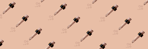 玻璃吸管化妆血清米色粉红色背景。图片下载