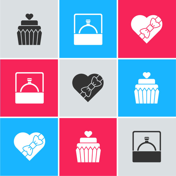 在结婚蛋糕上镶嵌心形订婚钻戒图片下载