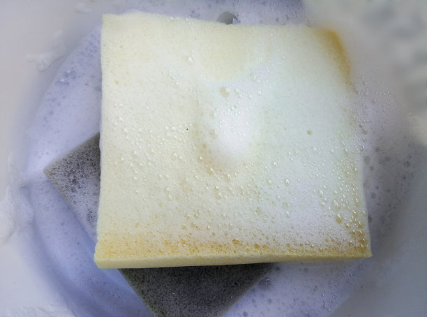 黄色和灰色海绵，白色泡沫染色泡沫图片下载