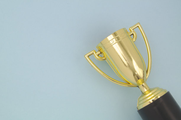 蓝色背景的冠军金杯图片下载