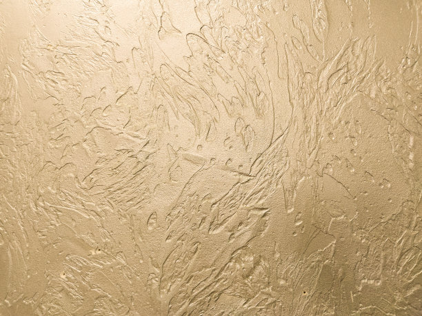 用金色油漆涂成纹理的墙图片下载