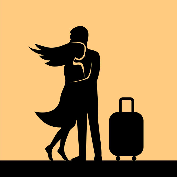 一个提着行李箱的年轻人和一个女孩拥抱在一起图片下载