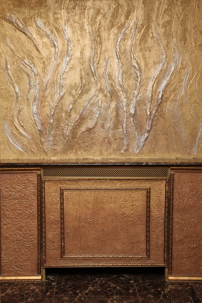 墙壁被漆成金色，有不同的色调和纹理图片下载