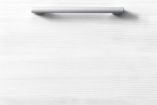 封闭的抽屉在厨房，白色室内现代公寓背景照片与复制空间图片下载