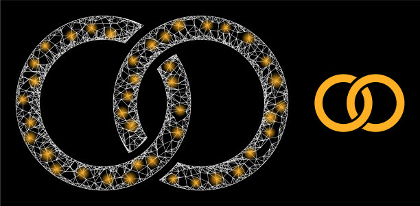 明亮的网状婚戒带有明亮的眩目斑点图片下载