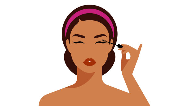 着色睫毛的睫毛膏。年轻女人化妆，画睫毛图片下载