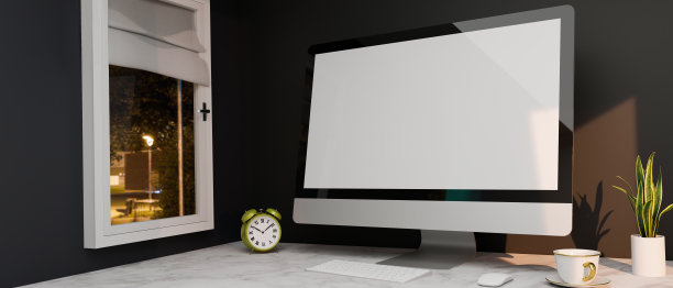 公寓工作空间与电脑桌面模型在大理石桌子靠近窗户图片下载