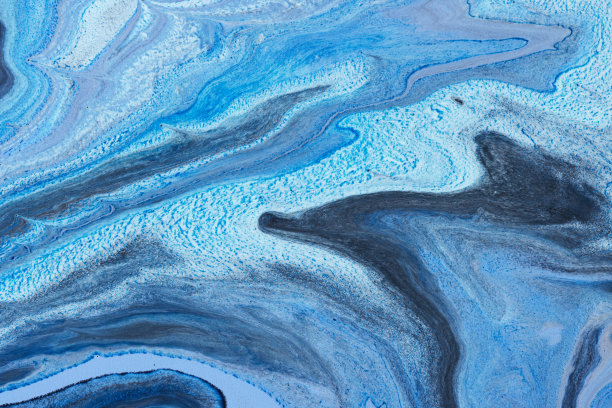 美丽的照片流动的墨水为背景。质感涂料图片下载