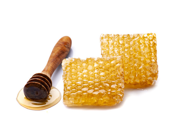 有液体蜂蜜的蜂巢图片下载