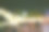 以散景作背景的复古色调模糊影像。节日活动派对与人模糊的背景。模糊人们的日落海滩派对在夏季假期图片下载