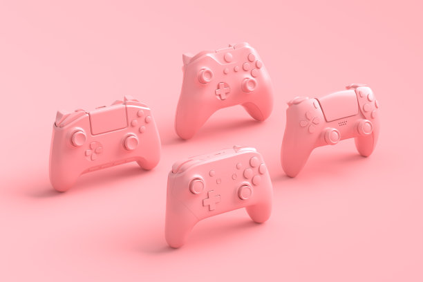 粉红色背景的一套站立游戏操纵杆或手柄图片下载