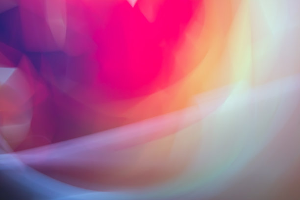 抽象的酒红色、紫红色和黄色背景由曲折的线条和亮点。柔和的渐变和模糊在多色色调。照片的效果。图片下载