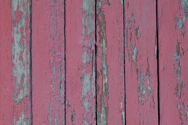 木板。老旧的油漆剥落。树状结构。木质表面。用木板做成的栅栏。图片下载