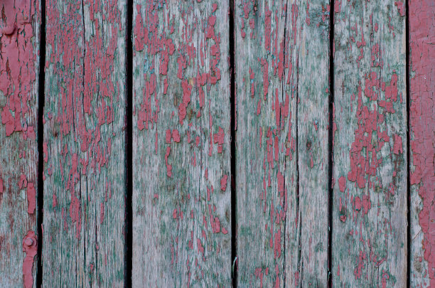 木板。老旧的油漆剥落。树状结构。木质表面。用木板做成的栅栏。图片下载