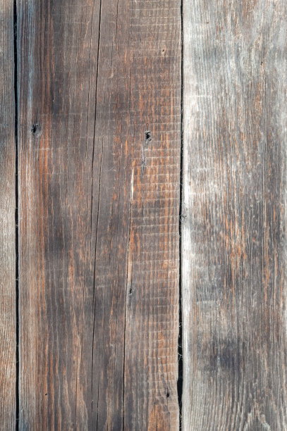 木材背景与棕色的褪色木板。枯燥乏味的木板。油漆剥落了。墙,俯视图图片下载