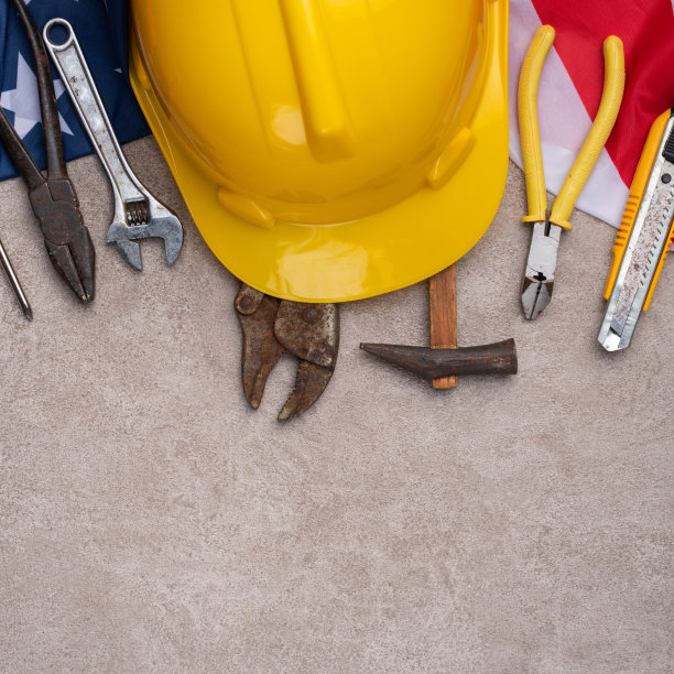 美国劳动节与工作工具的俯视图设计概念。图片下载