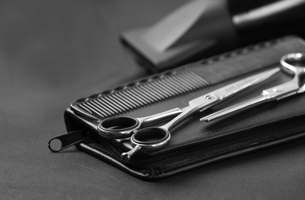 专业理发工具，口袋里，黑色发型师围裙，水平，无人，图片下载