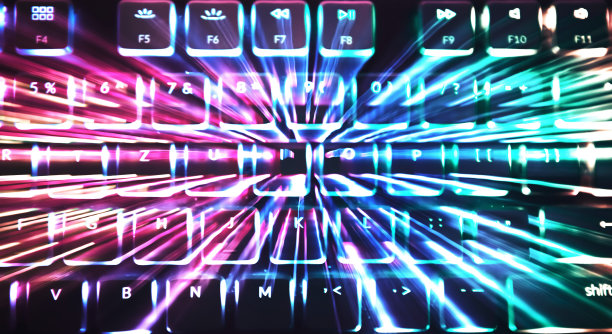 背光电脑键盘主题。数字和字母作为彩色线条的基础。图片下载