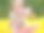 快乐微笑的女孩喝酸奶或牛奶在户外夏季野餐。手里拿着白色的塑料瓶，脸上还沾着酸奶图片下载